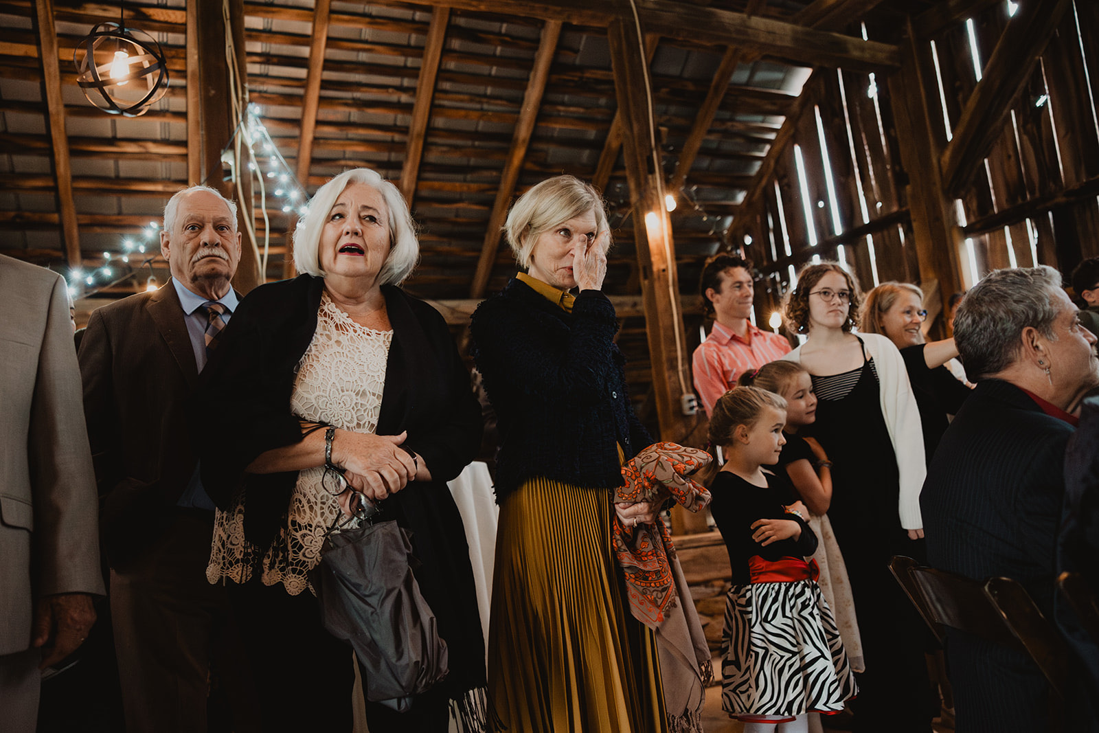 Two guests moved to tears at a barn wedding ceremony